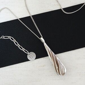 Long Silver Pendant, silver, teardrop shape, twisted metal, Chic, stylish, NWT